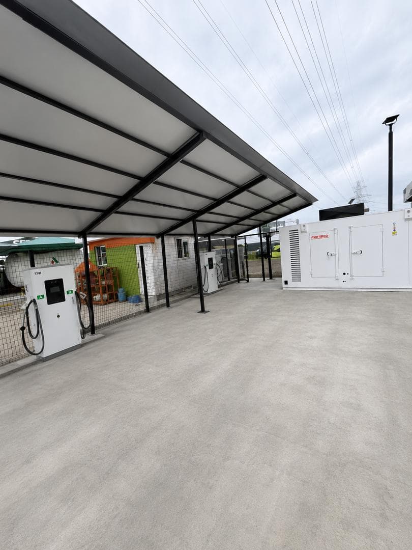 Blue Point EV charging canopy with DC fast chargers and supporting power infrastructure